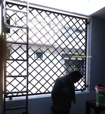 Sửa cửa sắt và làm thêm khung bảo vệ sắt trên sân thượng tại quận 9